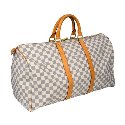 white Louis Vuitton duffle bag